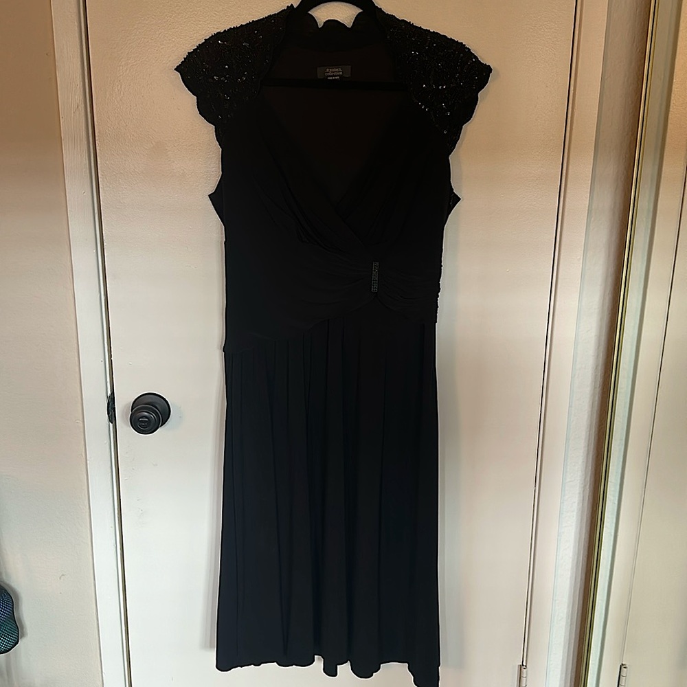 Black 40s style dress.